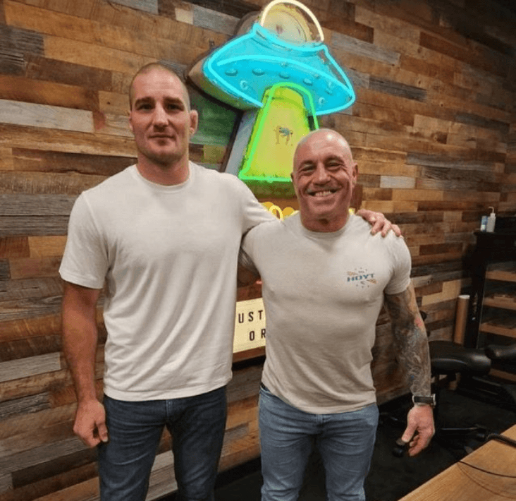 Joe Rogan Explains Why Sean Strickland Can Beat Khamzat Chimaev at UFC 328: "He Has a Legit Chance" cover image